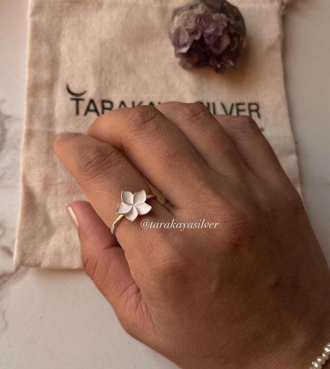 White enamel floral silver ring with plumeria design