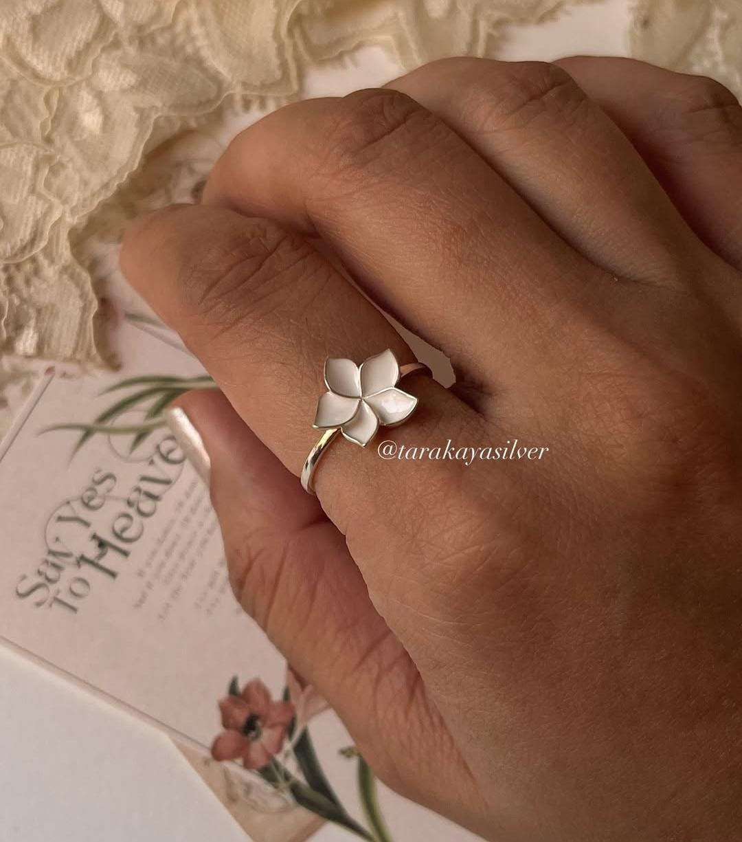 Sterling silver plumeria flower ring with white enamel petals