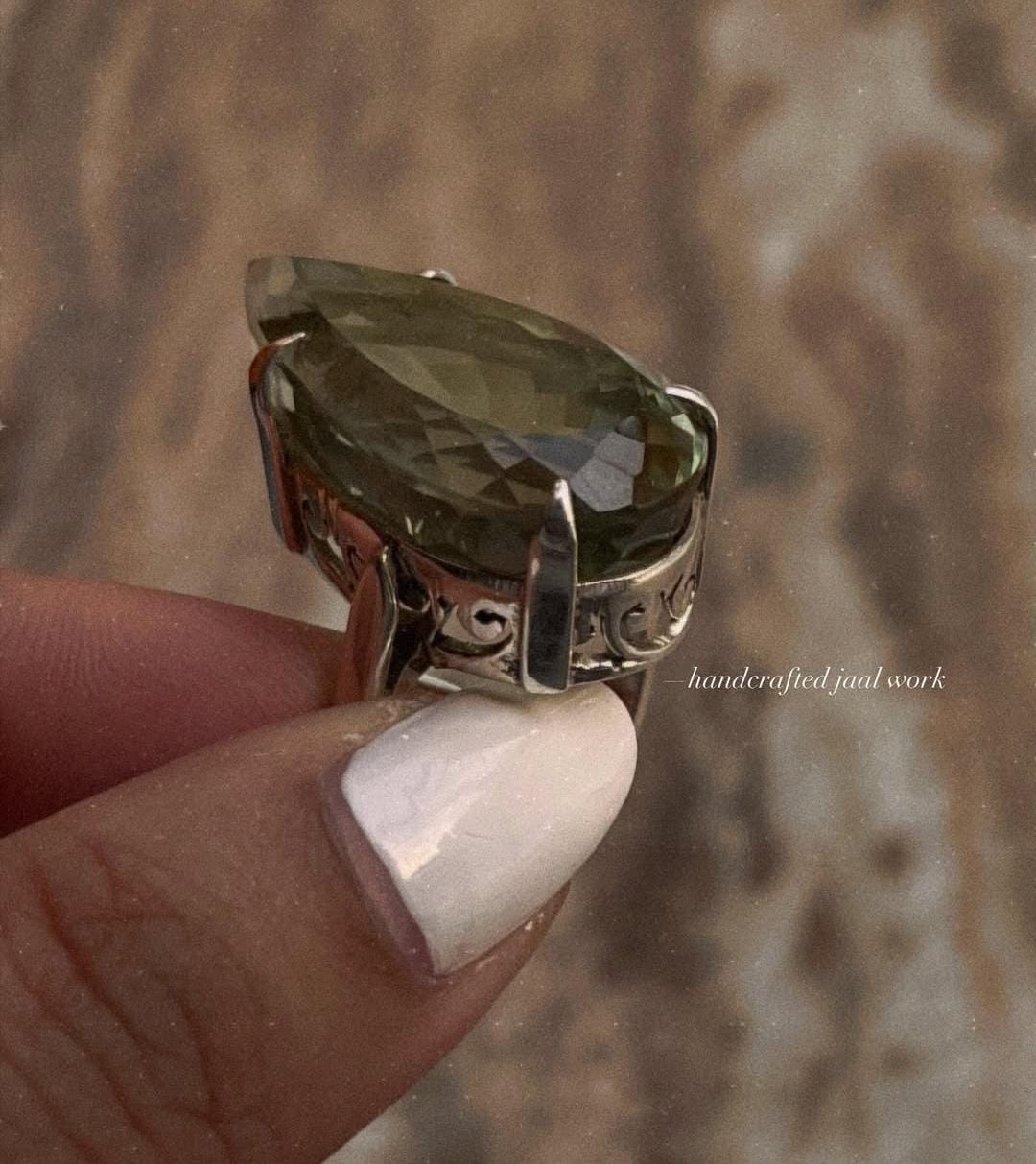 Handcrafted solitaire ring with green amethyst in 925 silver