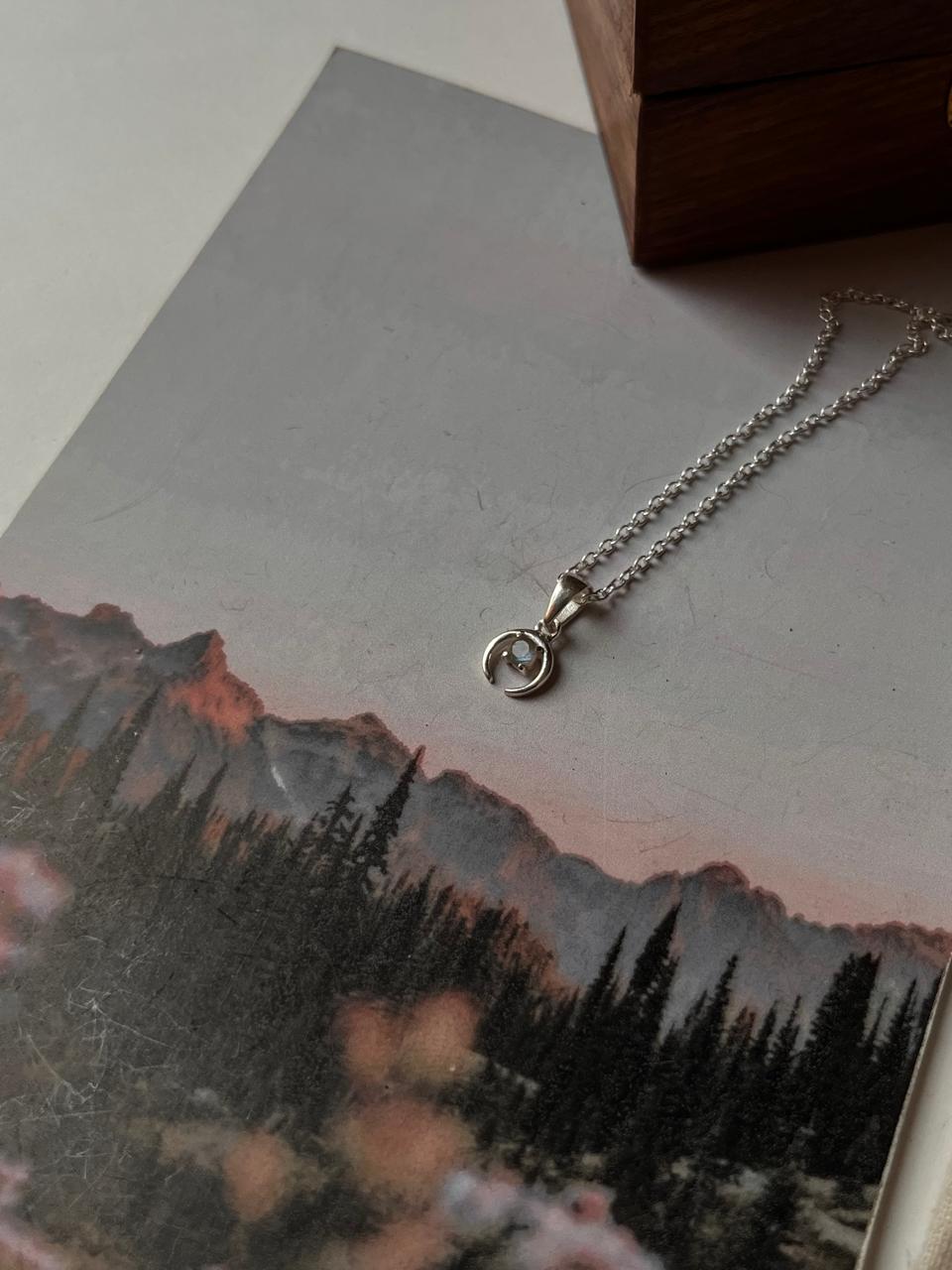 Small crescent moon necklace with labradorite charm in silver