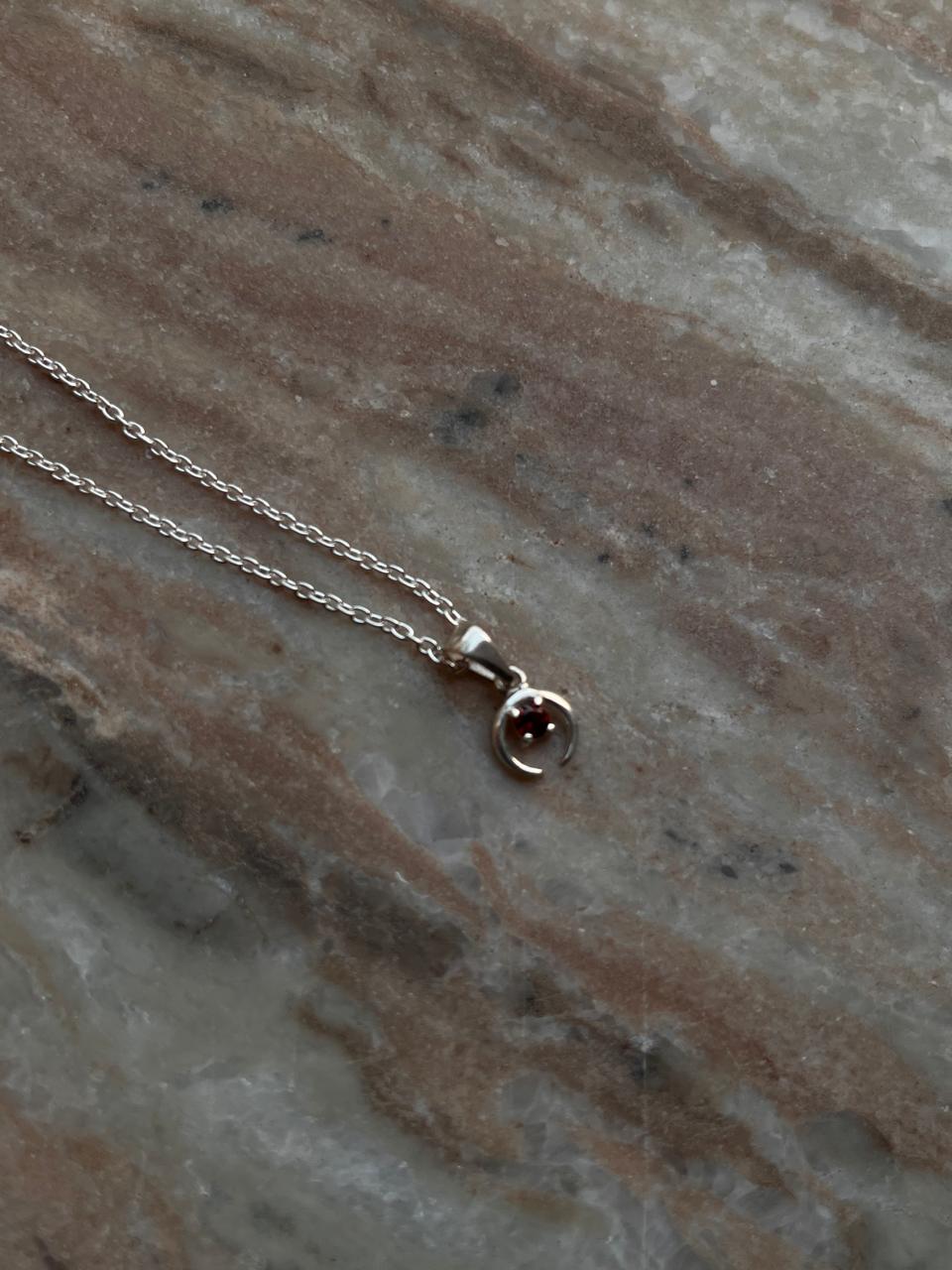 Handcrafted garnet crescent moon pendant in 925 silver