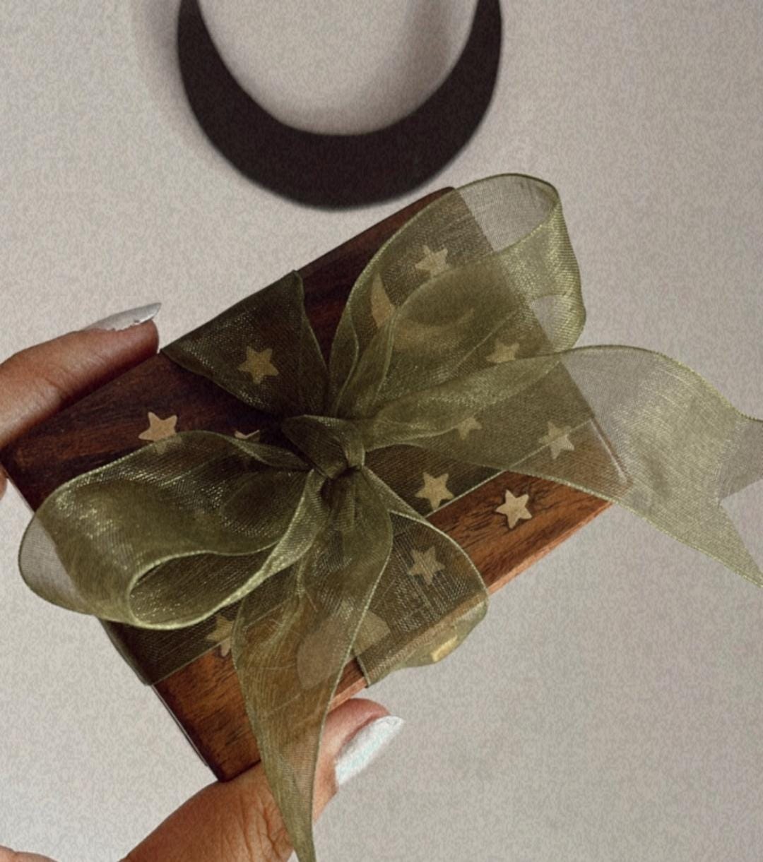 Ribbon-tied gift with personalized card – box not part of wrapping