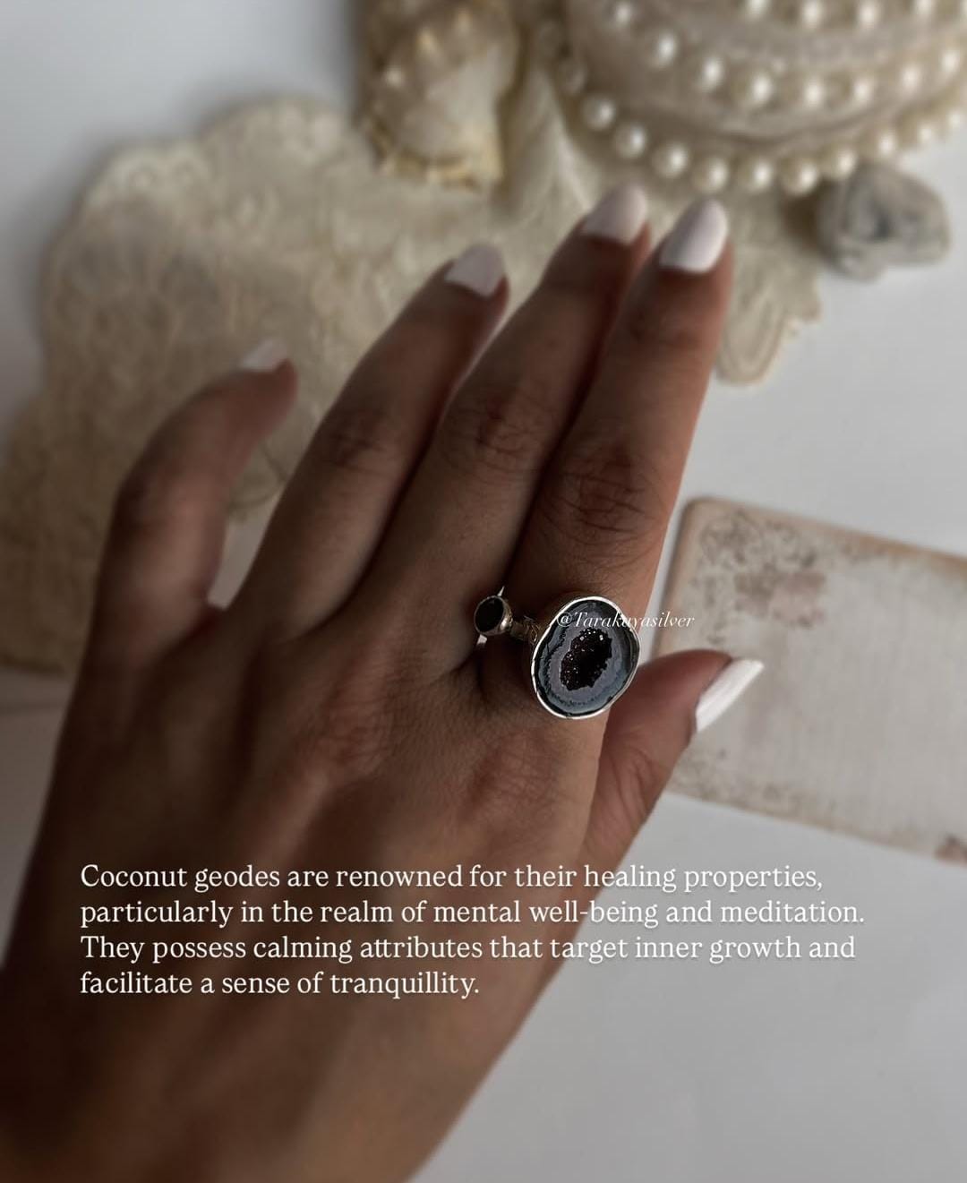 Handcrafted silver ring featuring red coconut druzy geode and garnet
