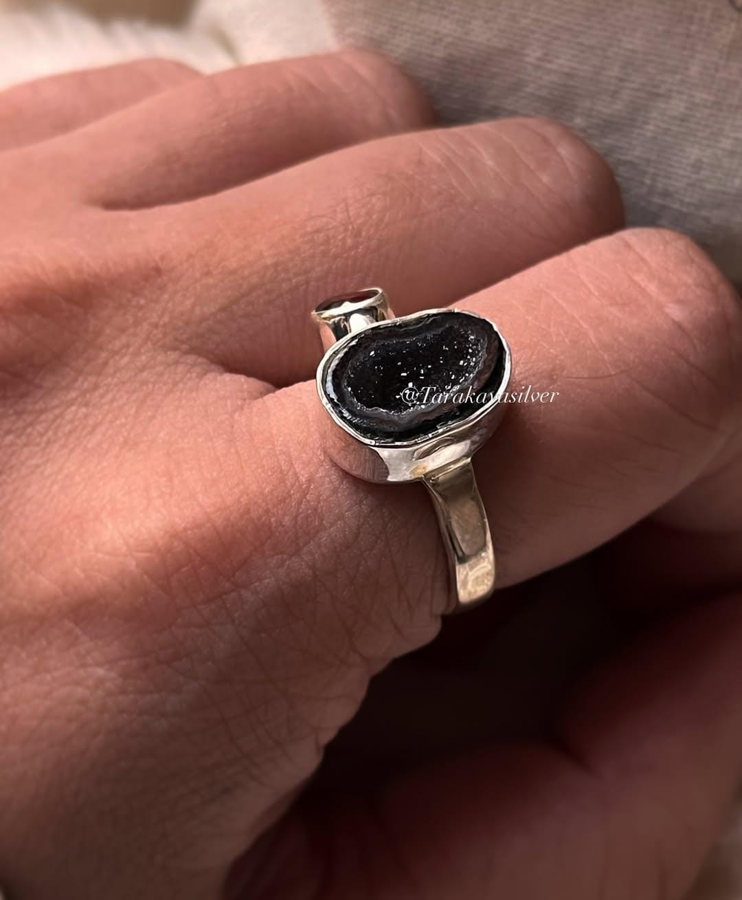 Handcrafted silver ring featuring red coconut druzy geode and garnet