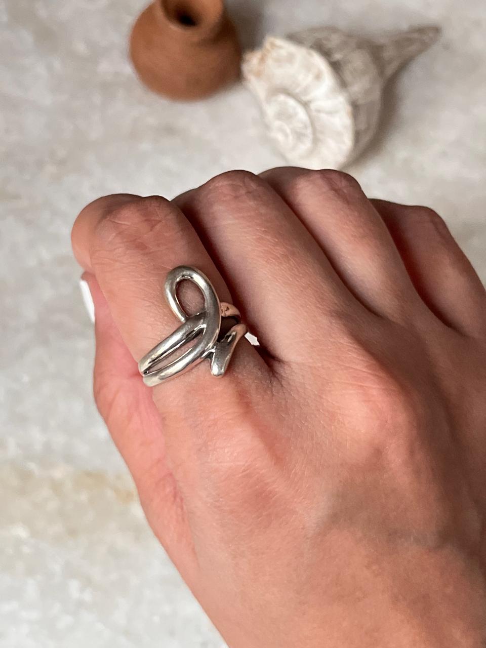 Unisex sculpture-inspired knot ring in sterling silver