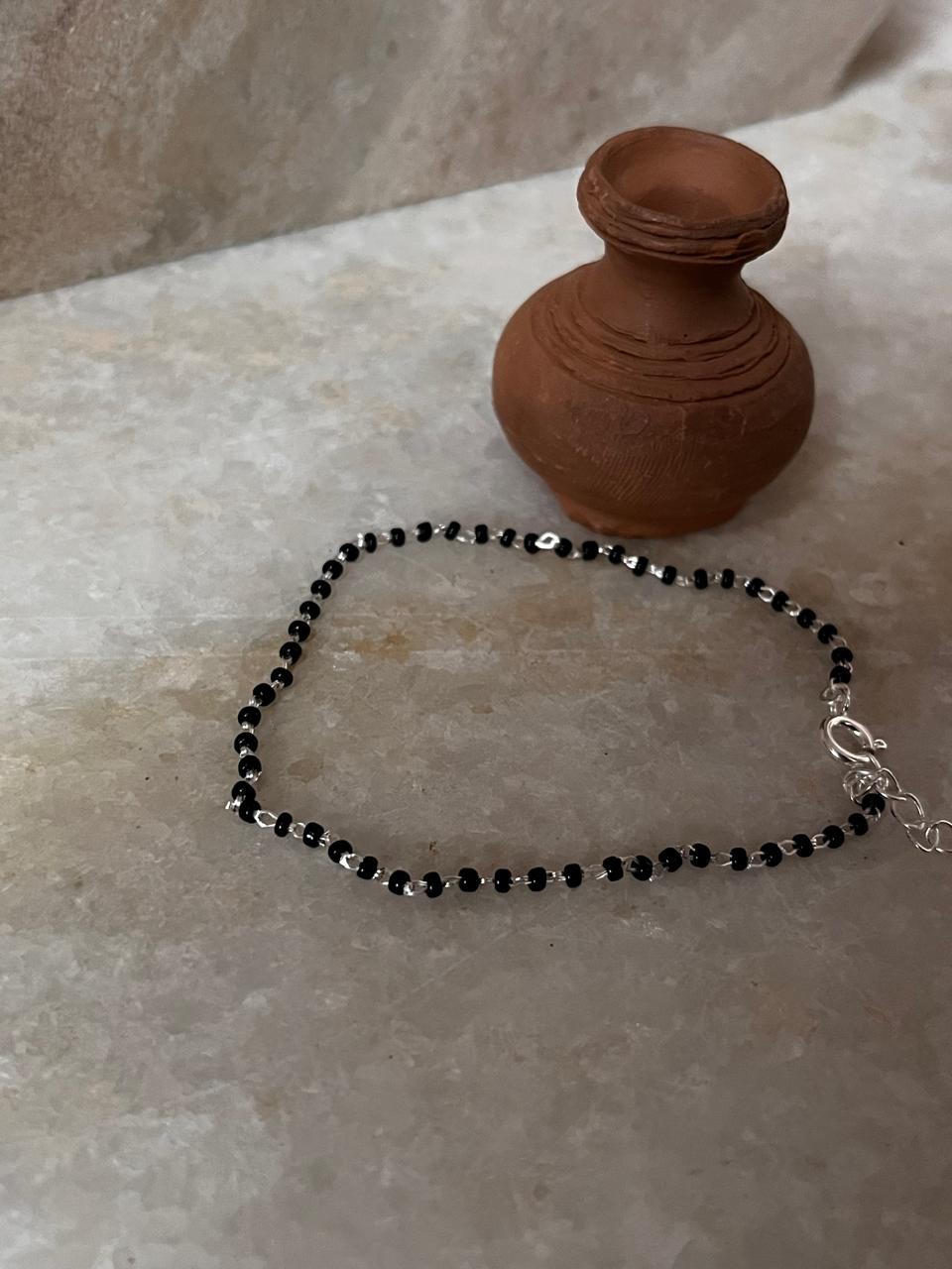 Unisex nazar dosh anklet with silver and black beads