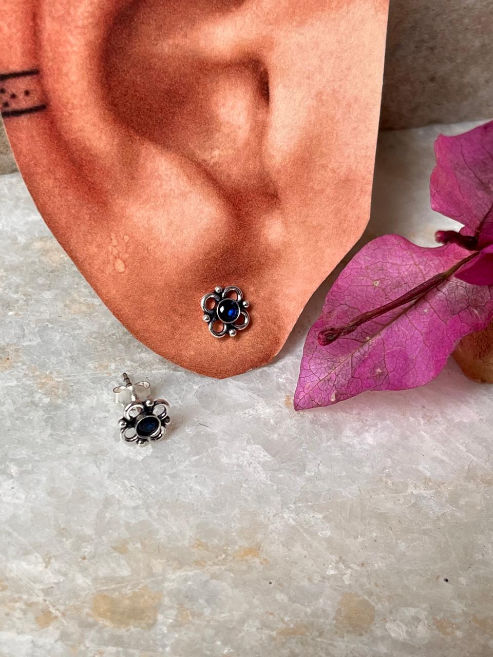 925 silver flower-shaped stud earrings with sparkling blue CZ
