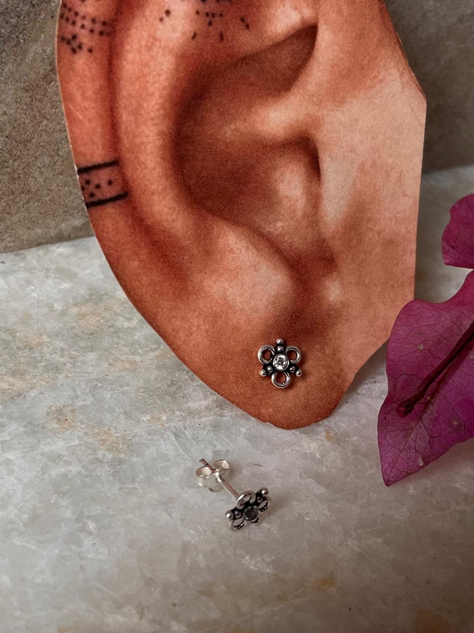 Classic sterling silver floral studs with sparkling CZ