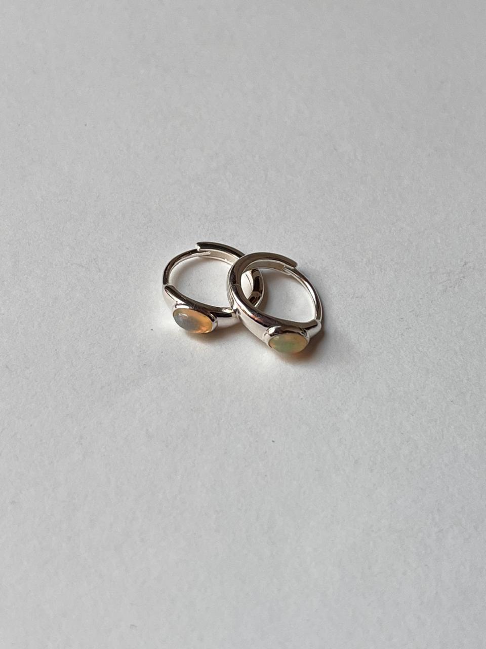 Dainty oval huggie earrings with natural Ethiopian opal