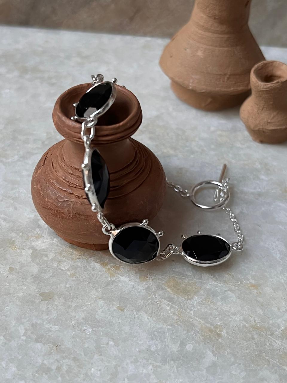 Handcrafted sterling silver bracelet with black onyx