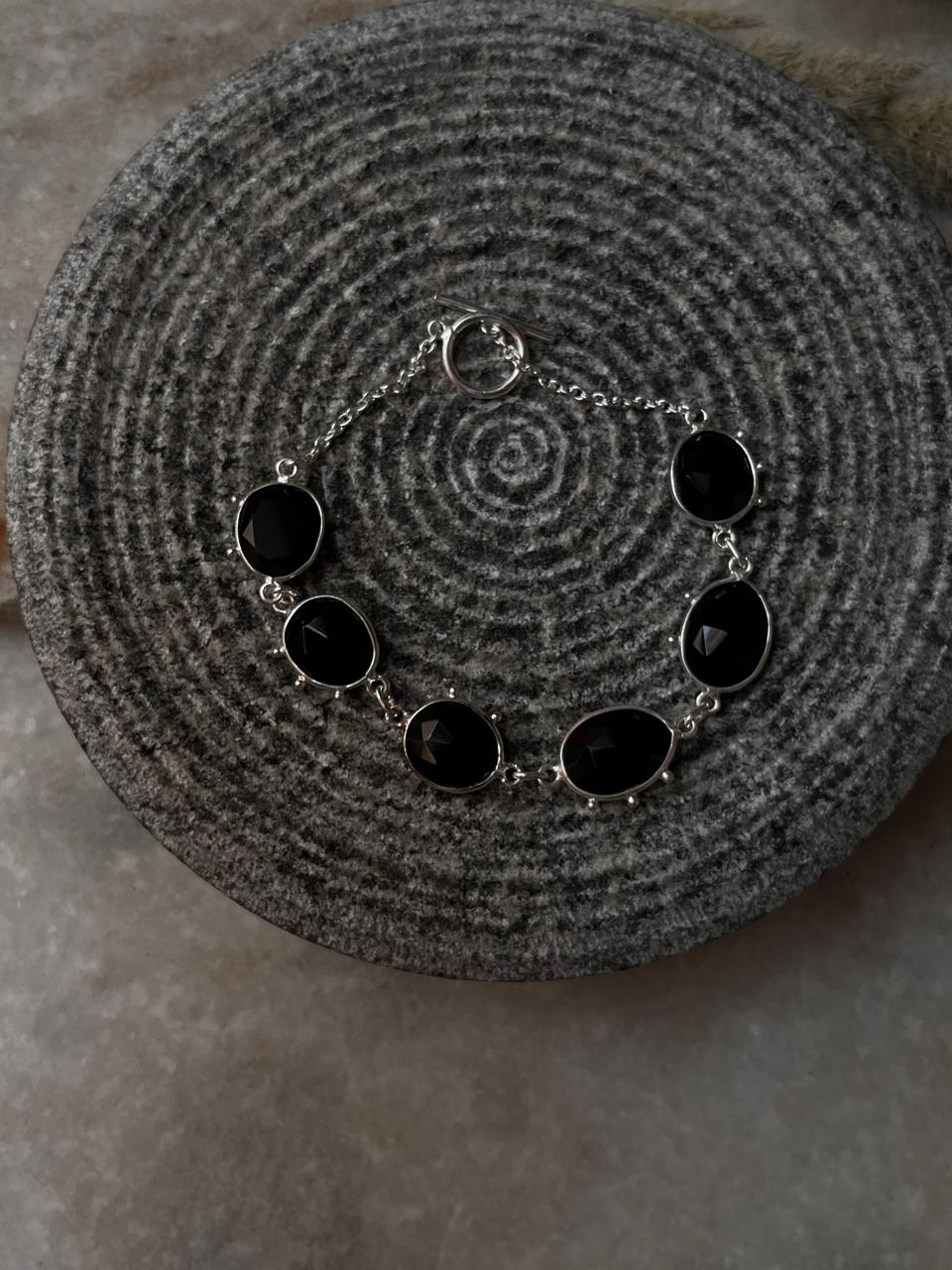 Luxury black onyx gemstone bracelet with silver accents