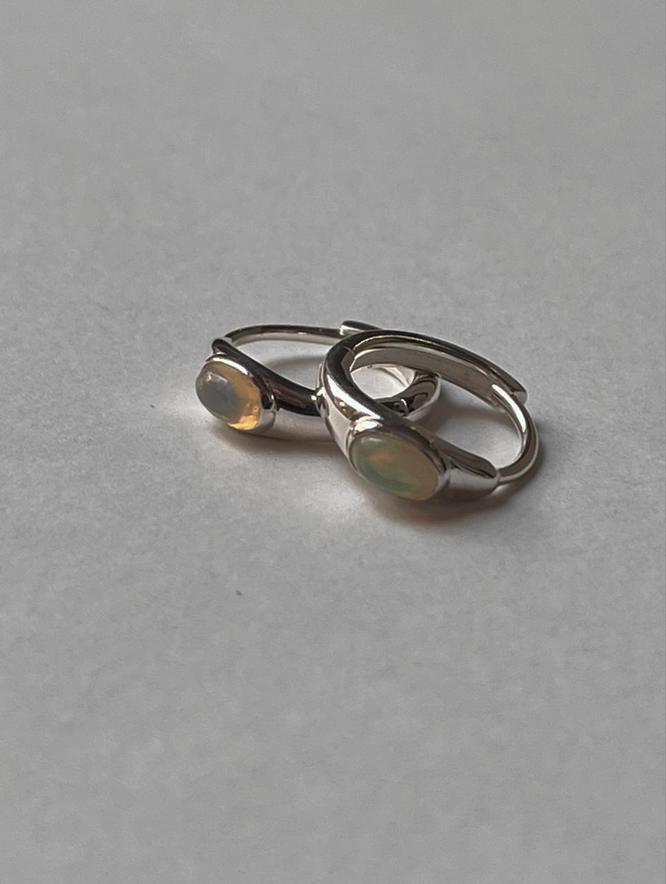 Classic oval Ethiopian opal sterling silver huggie earrings