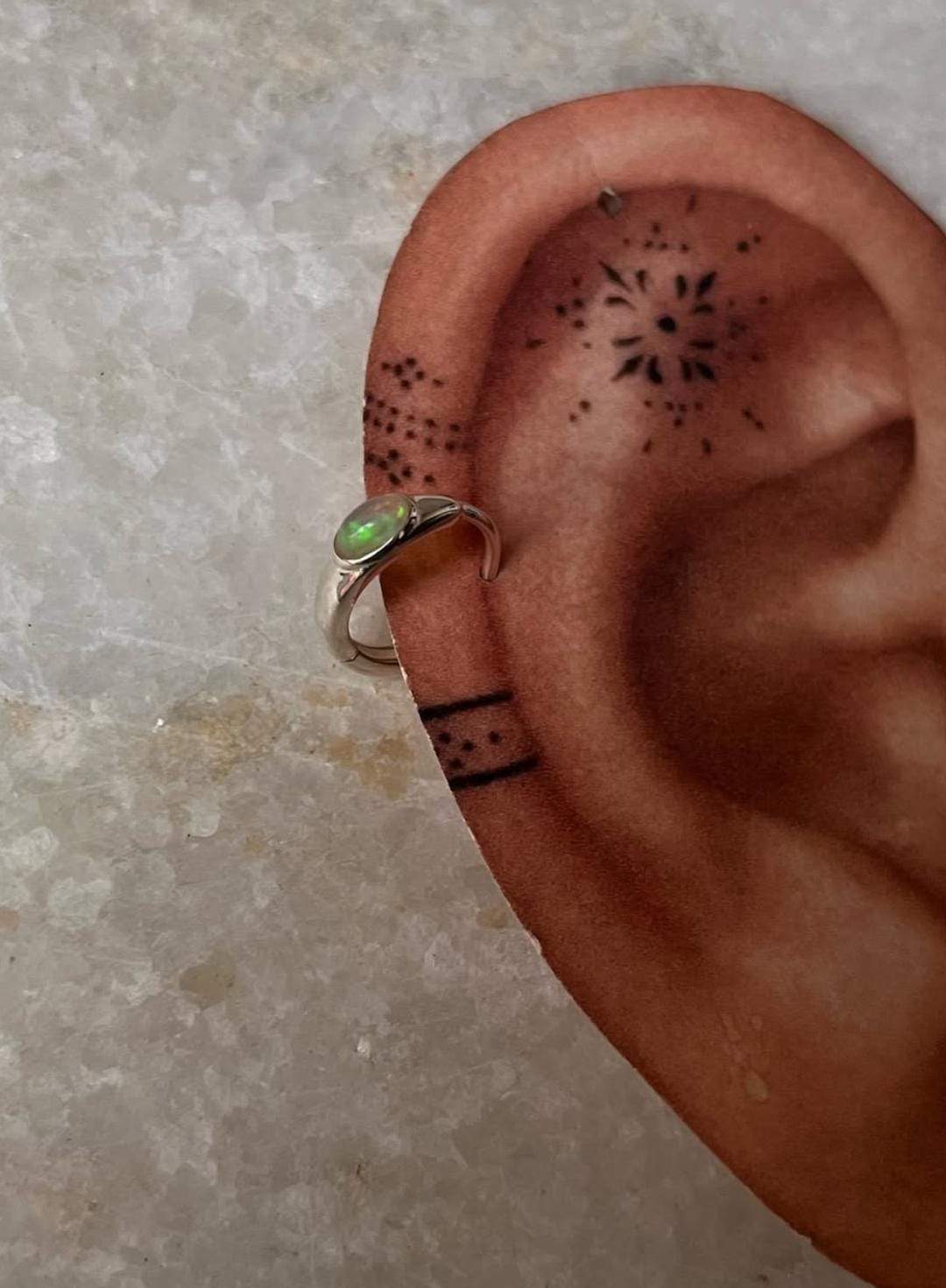Iridescent Ethiopian opal oval stone huggie earrings