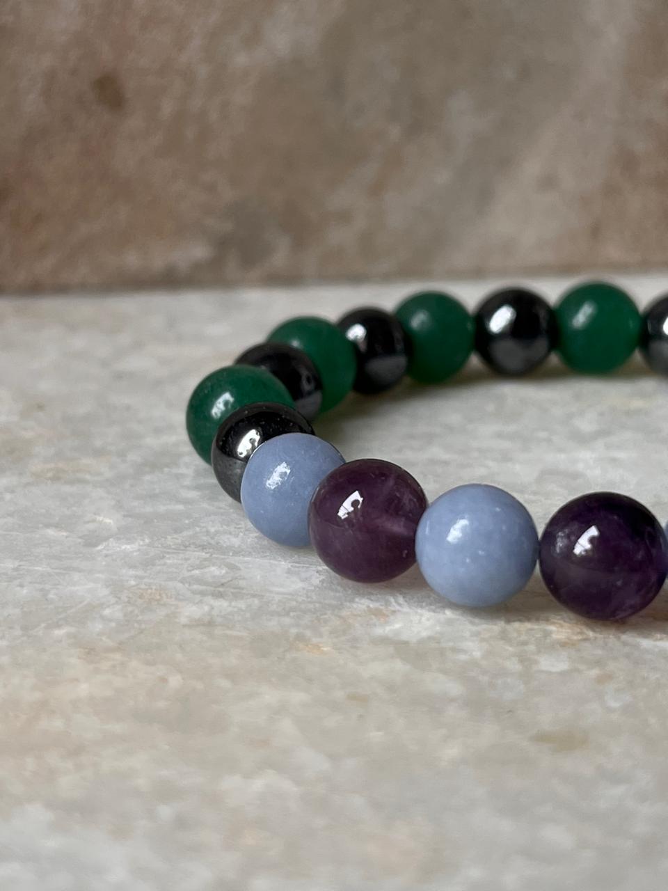Aquarius zodiac bracelet with single healing crystal