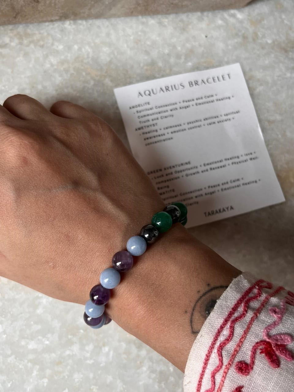 Minimalist Aquarius zodiac bracelet with natural crystal