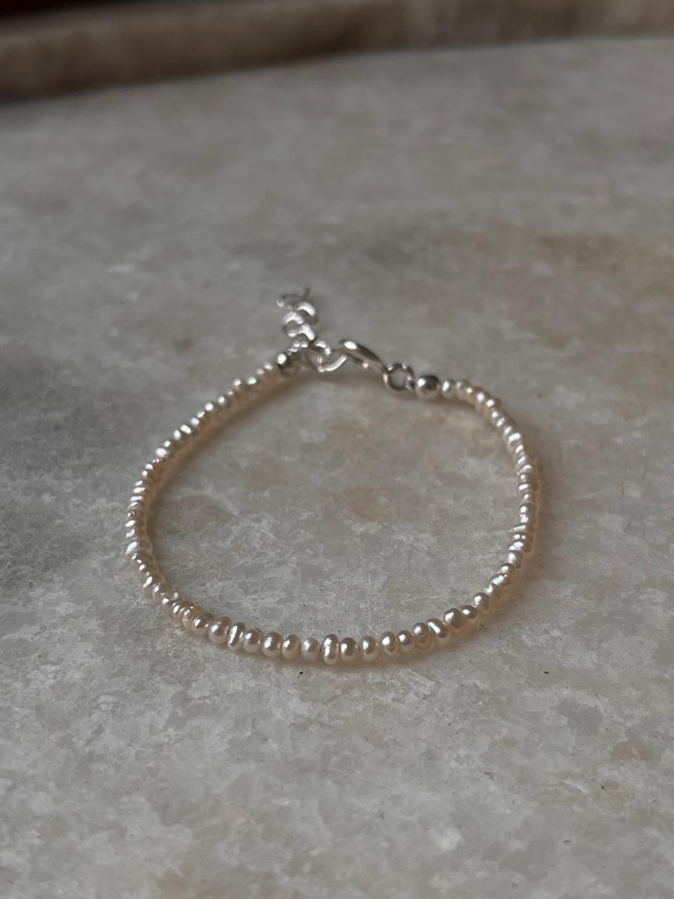 Handcrafted silver bracelet with classic freshwater pearls