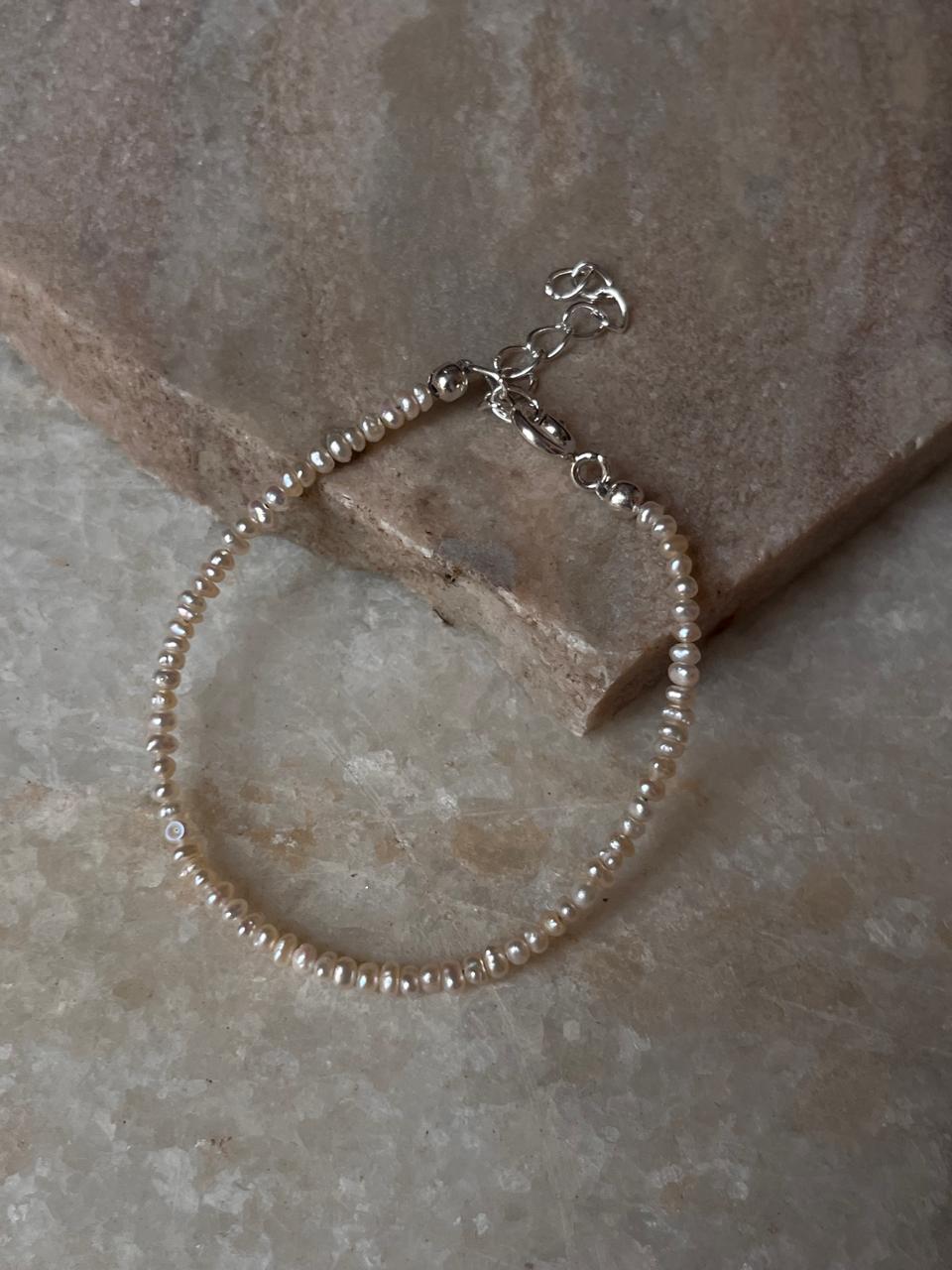 Elegant pearl stacking bracelet with silver lock