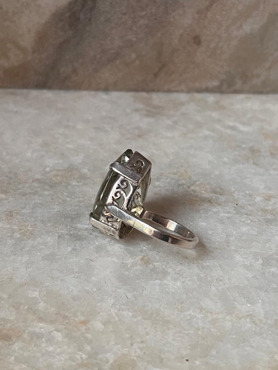 Polished silver statement ring with green amethyst