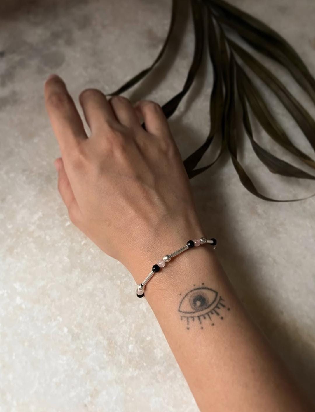 Stylish Sterling Silver Bracelet with Black Onyx and Rose Quartz Crystals
