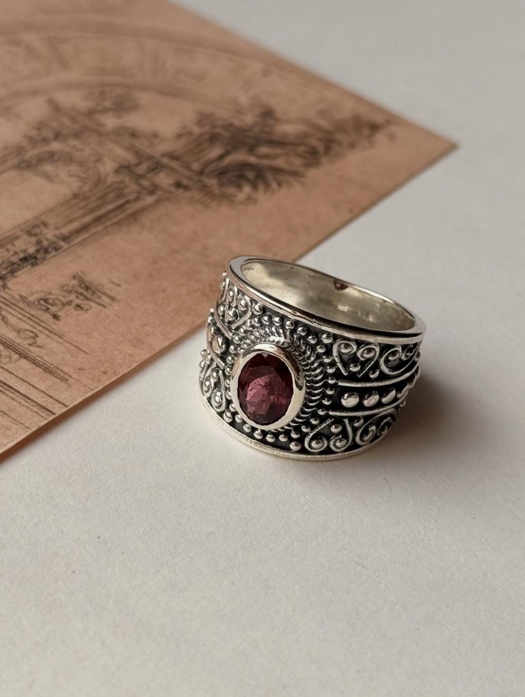 Handcrafted sterling silver ring with faceted pink tourmaline gemstone