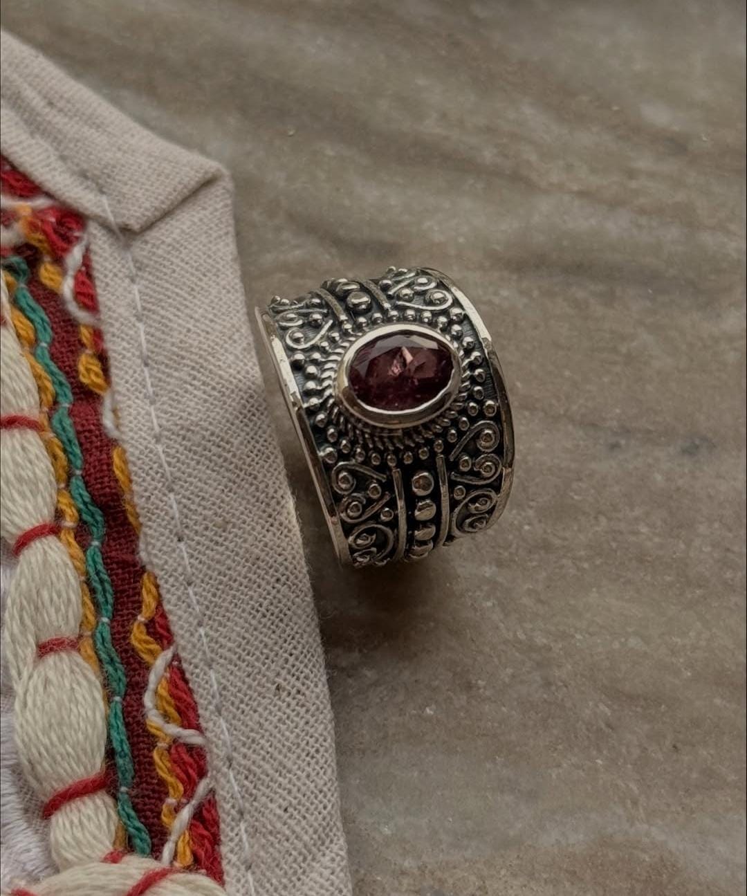 Artisan crafted 925 silver ring with faceted pink tourmaline stone