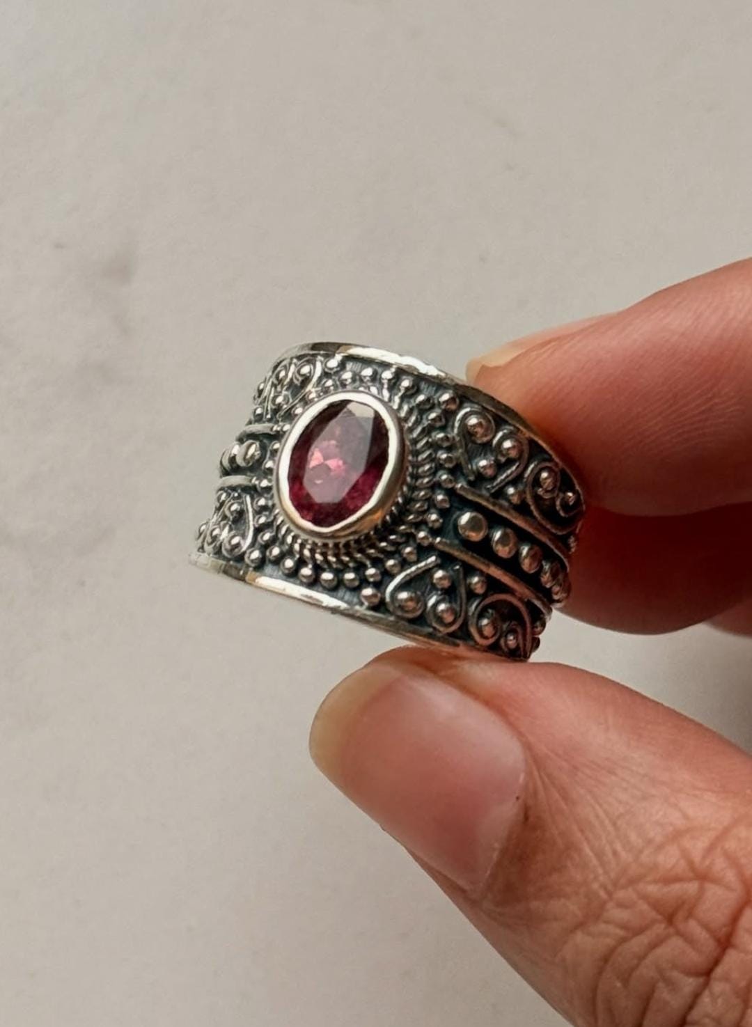 Handcrafted sterling silver ring with faceted pink tourmaline gemstone