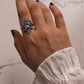 Elegant vintage 925 silver ring with intricate forest and leaf detailing