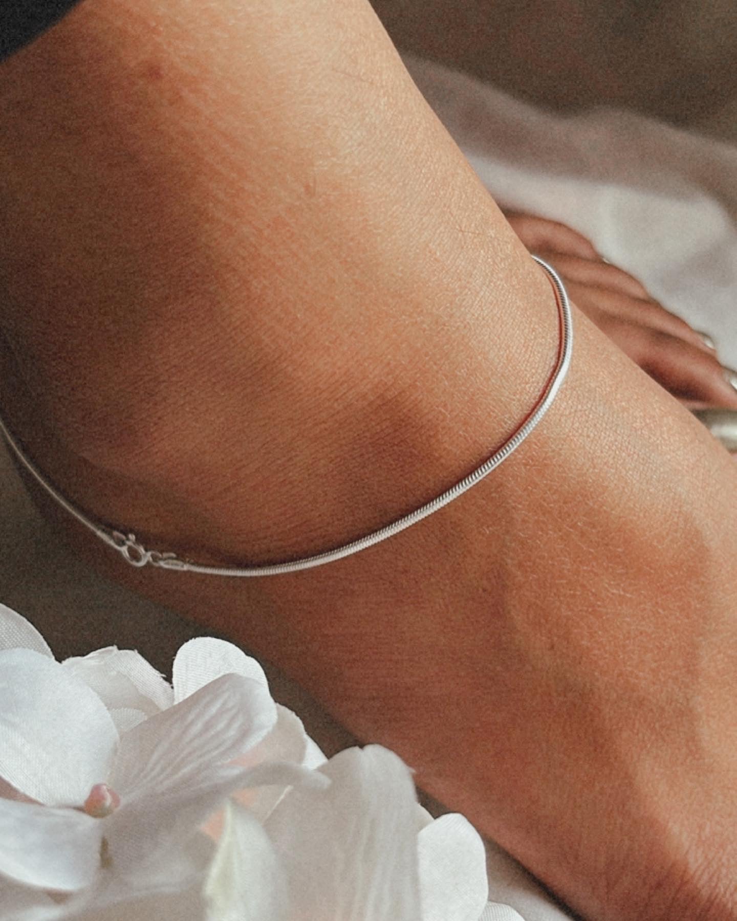 Sleek and stylish classic snake chain anklet in sterling silver