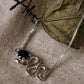 Minimal Silver Bracelet with Black Onyx and Serpent Design