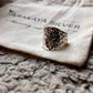 Sleek chunky silver ring with hammered texture