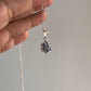 Handcrafted tanzanite flower pendant with silver setting
