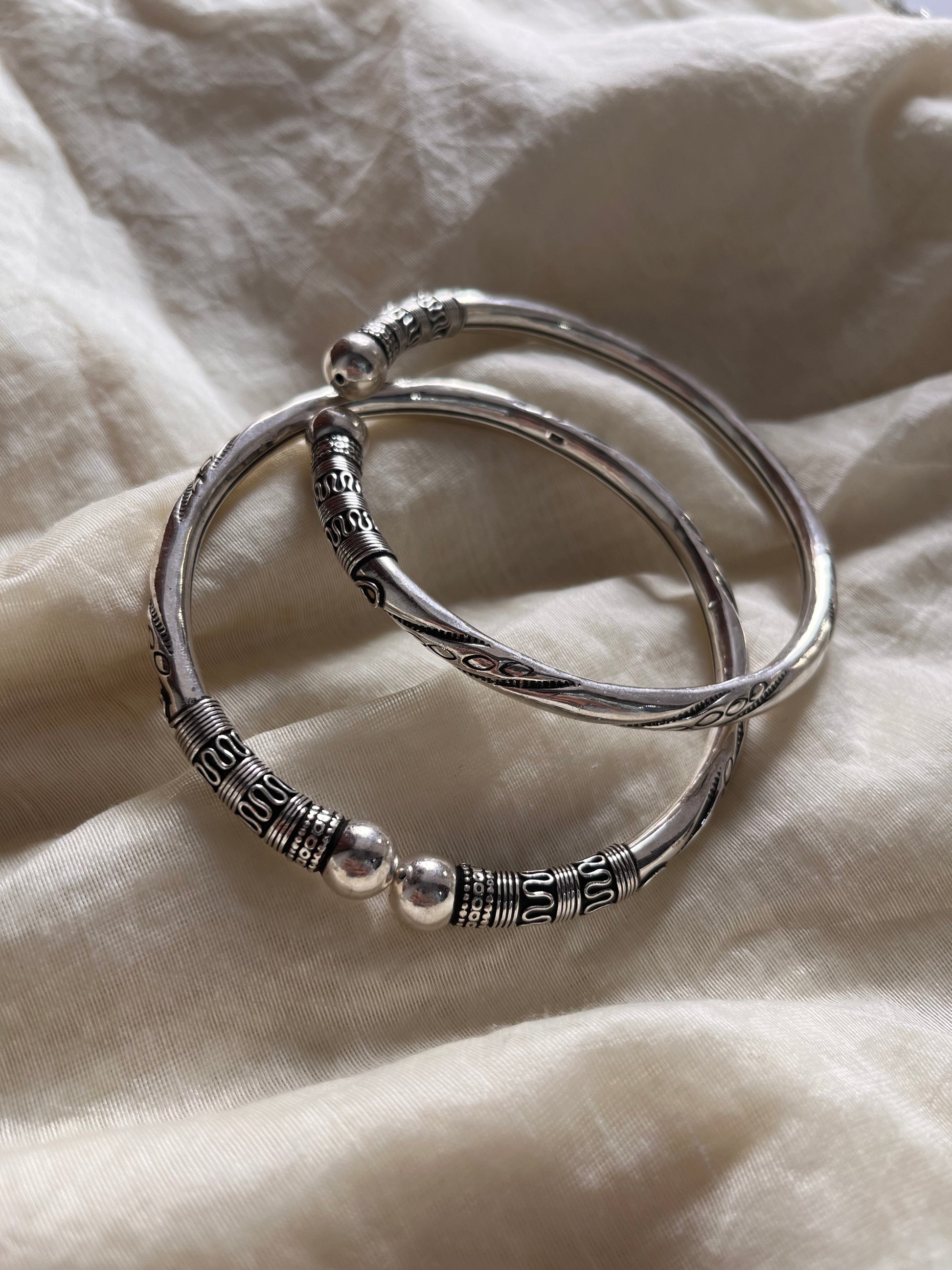 Design 2 Leg Kada in Silver for Stylish Footwear Accessory