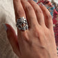 Handcrafted chunky silver ring with a beautiful floral garden pattern.