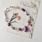 Lunar-inspired silver charm bracelet with amethyst accents
