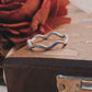 Elegant wavy band silver ring