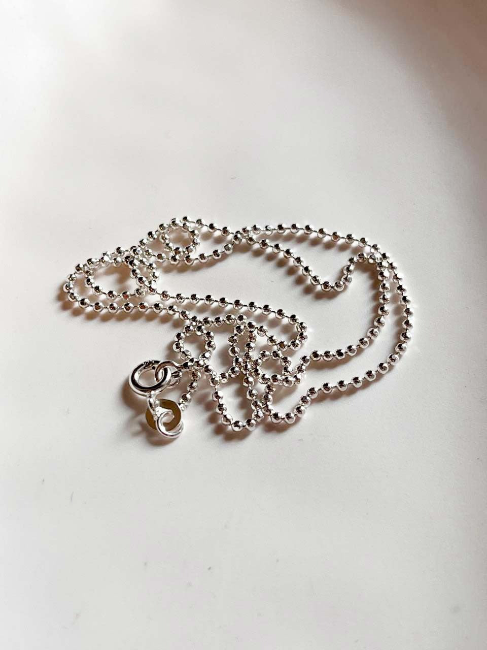 Versatile dot ball silver chain with smooth spherical details