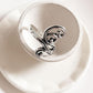 Silver ring with intricate vintage spiral design
