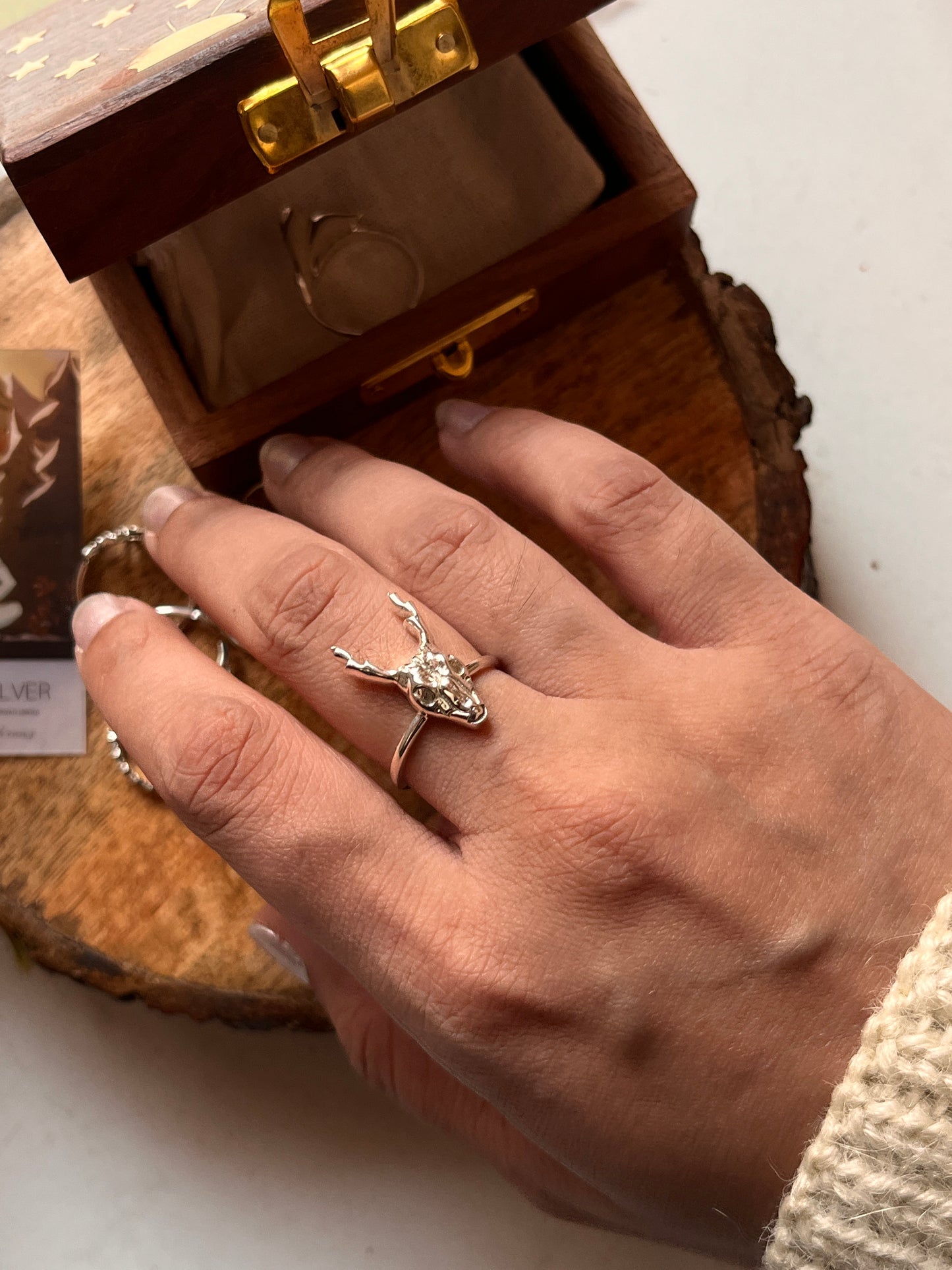 Handcrafted silver ring with a detailed and artistic deer skull