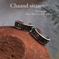 Close-up of pure silver toe rings featuring Chand Sitare design