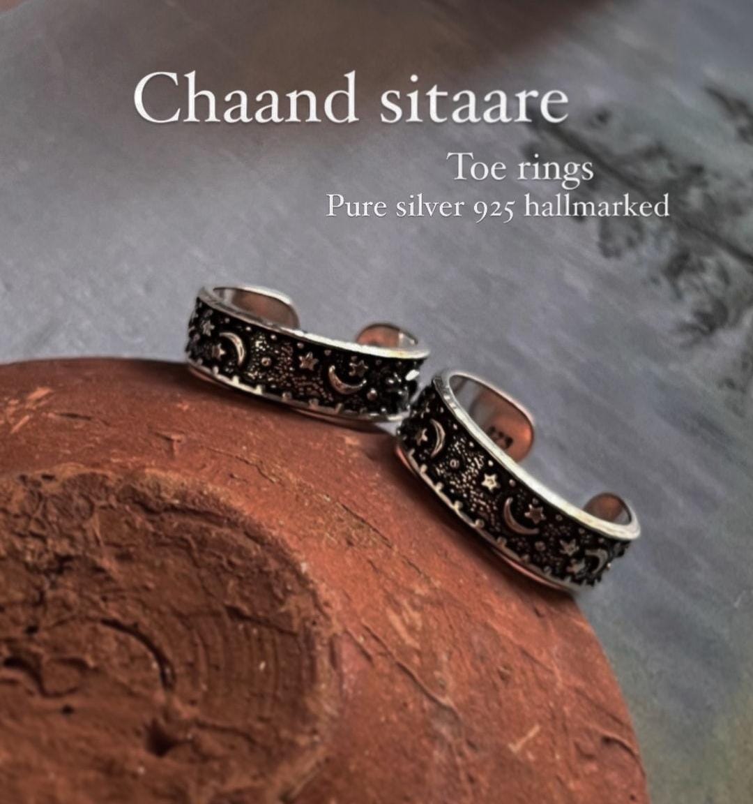Close-up of pure silver toe rings featuring Chand Sitare design