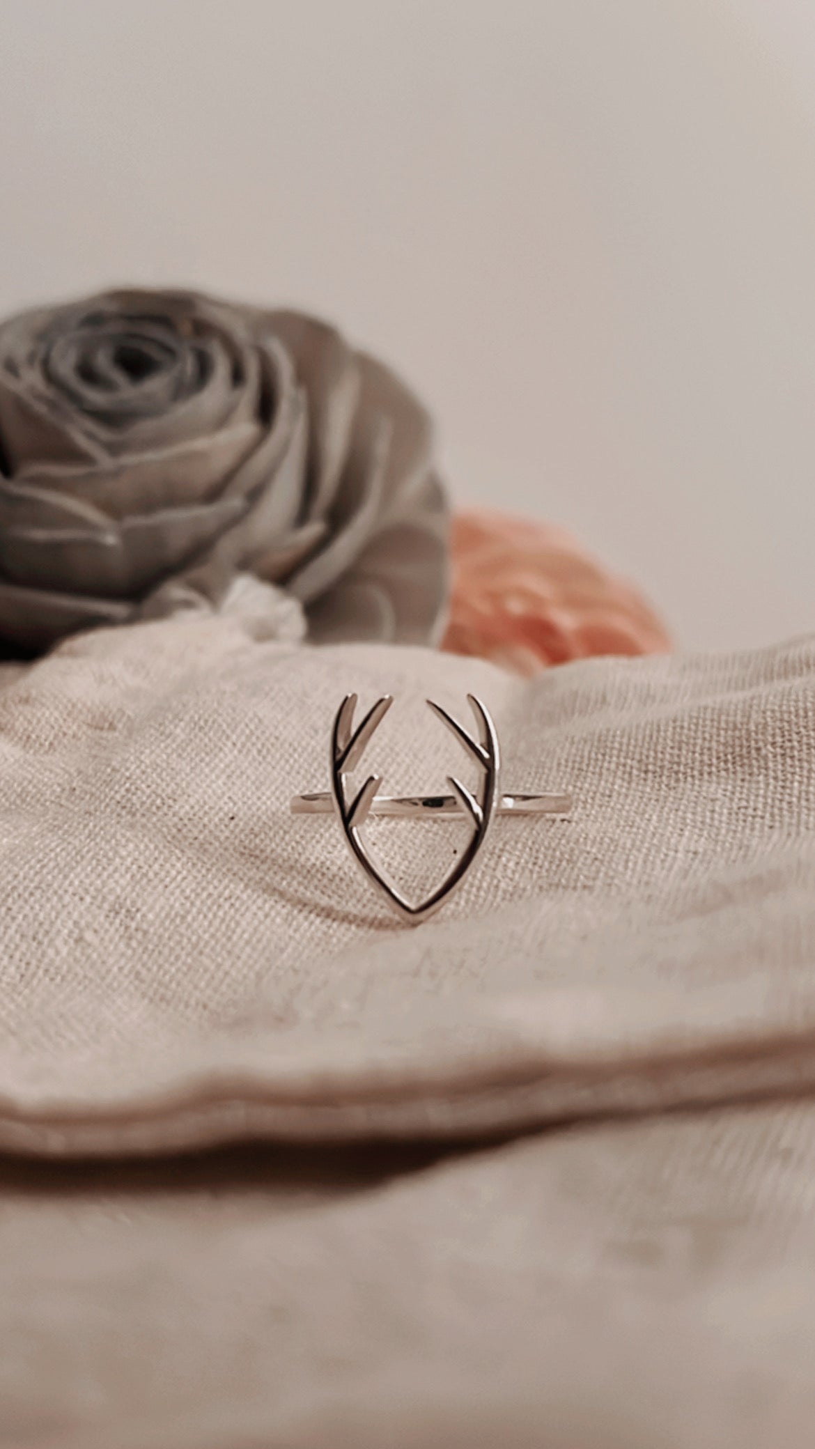 Sleek and stylish antler silver ring with organic detailing.