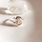 Rose quartz oval cross band silver ring with unique design