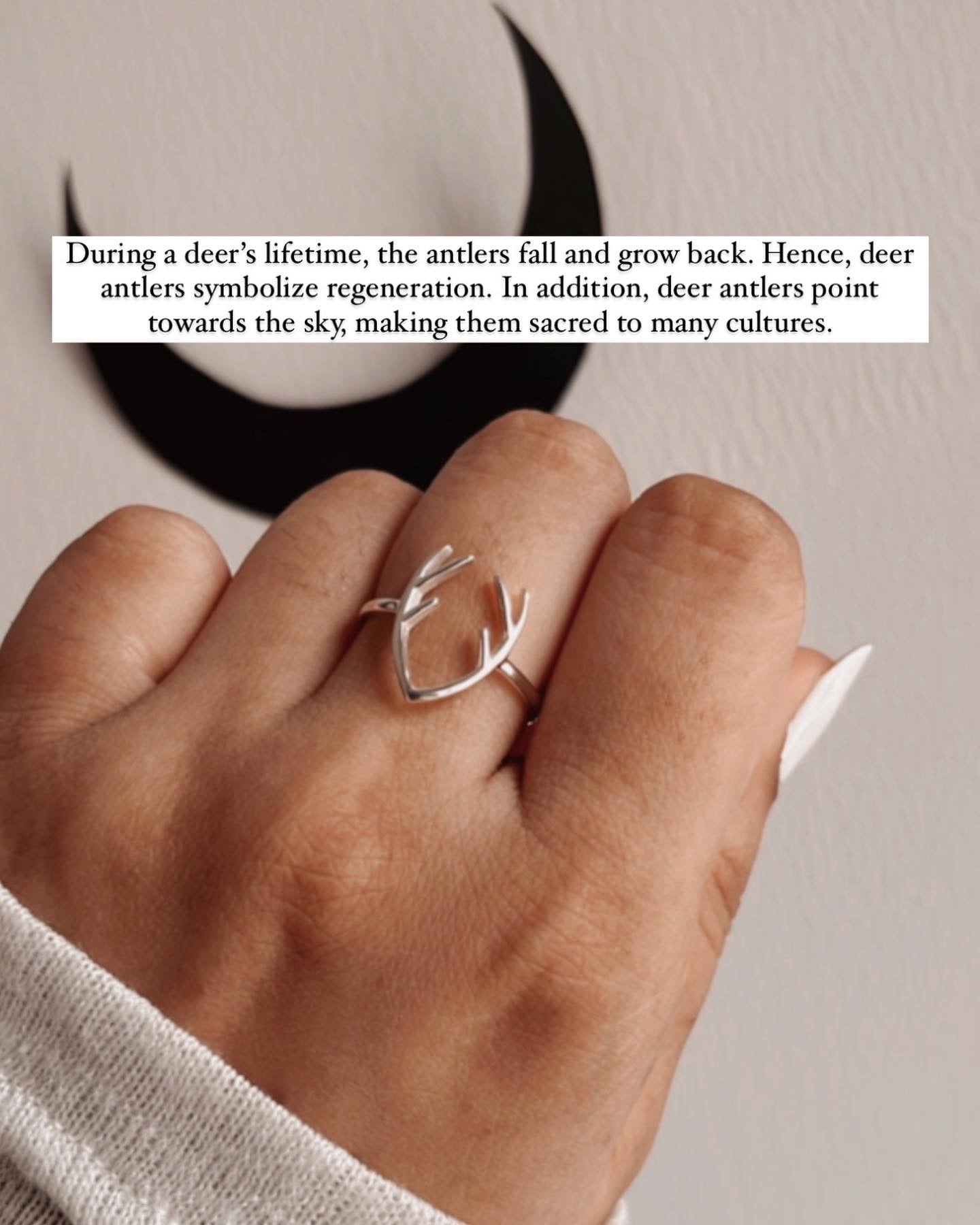 Nature-inspired antler design silver ring with intricate detailing.