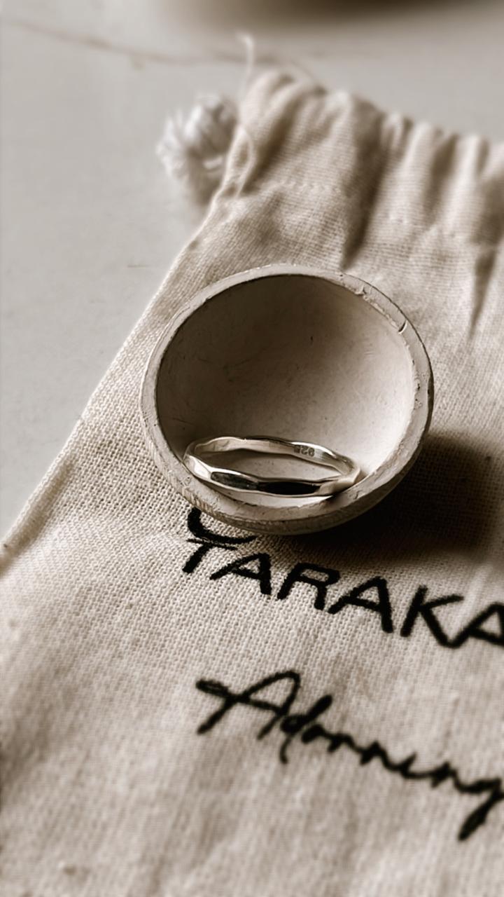 Sleek stackable hammered silver band ring