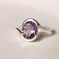 Silver Ring with Oval-Cut Amethyst and Intricate Cross Band