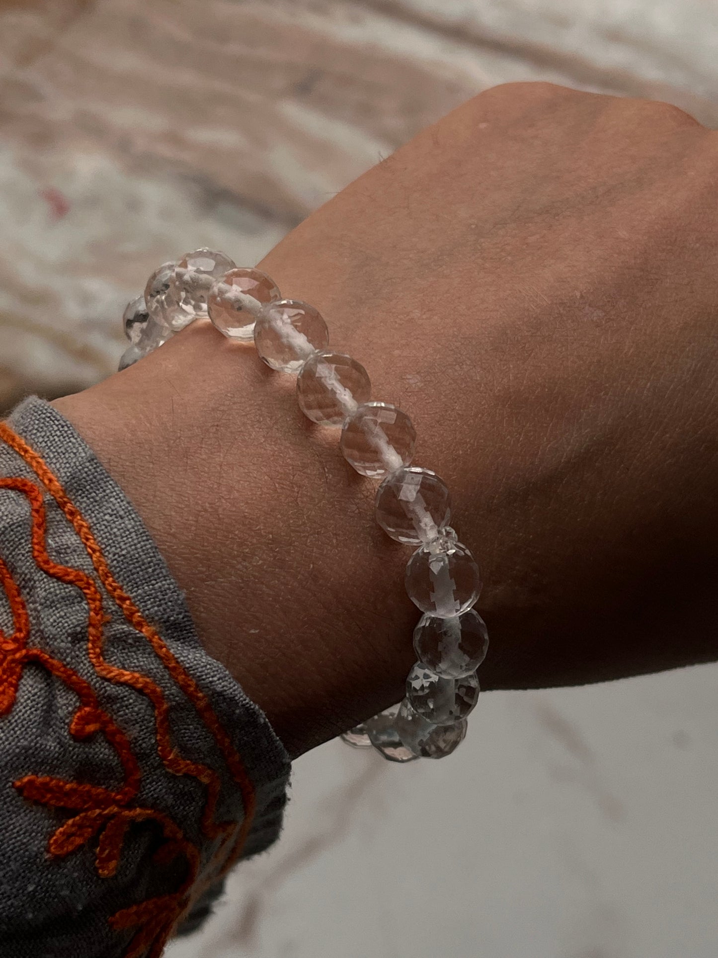 Handmade 8mm clear quartz crystal bracelet with faceted finish  