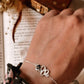 Elegant Black Onyx Serpent Design Silver Bracelet