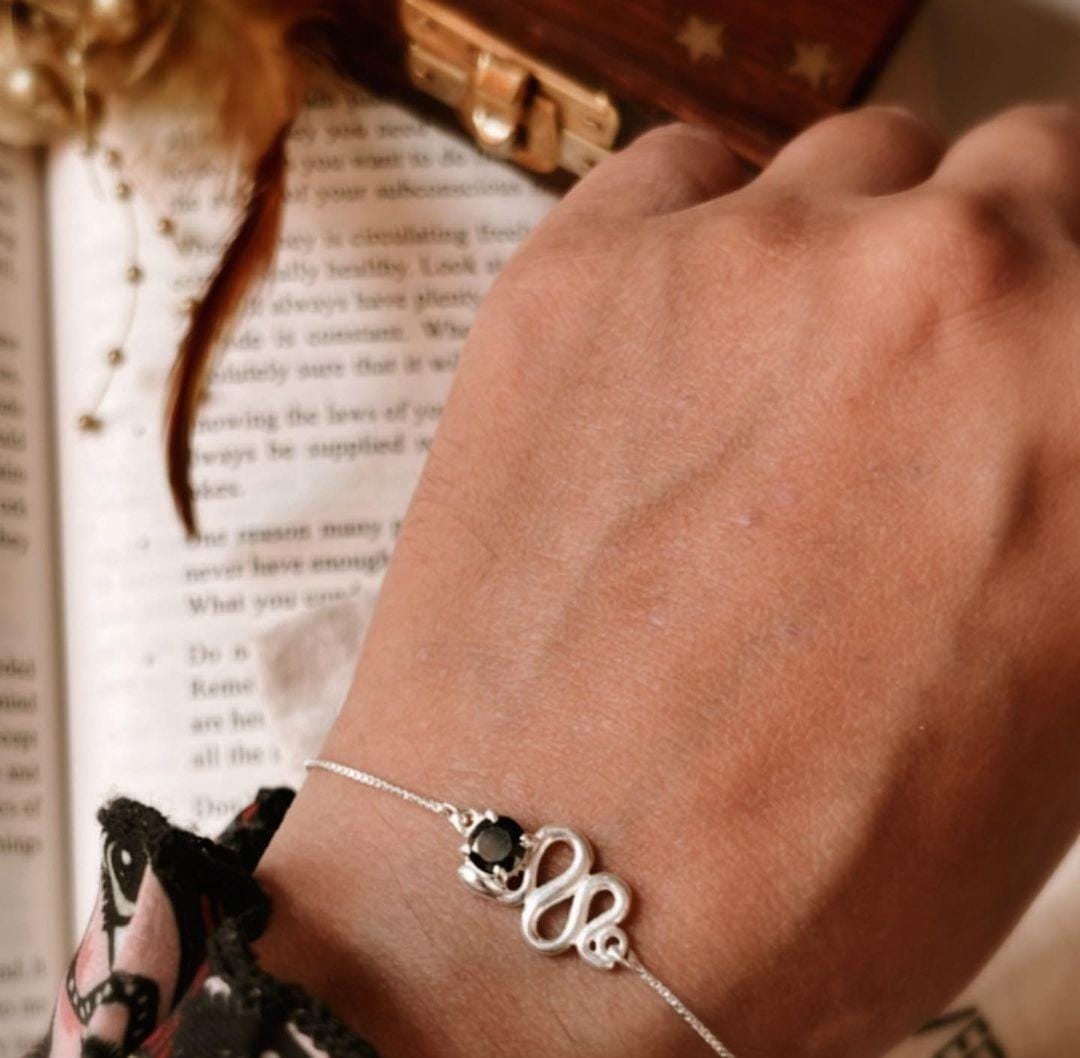Elegant Black Onyx Serpent Design Silver Bracelet