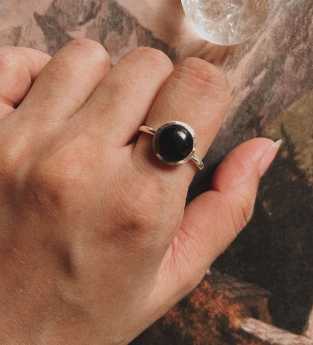 Sleek Black Onyx Round Ring Set in Silver