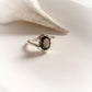Sophisticated smokey quartz cross oval cut ring in sterling silver